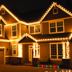 Christmas lights decorating the exterior of a house
